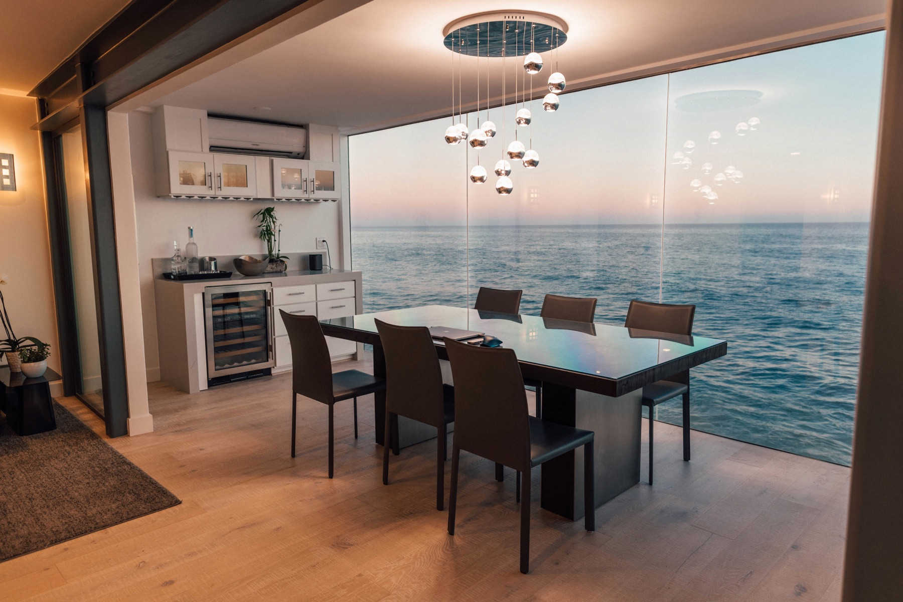 Dining room with floor-to-ceiling sea views